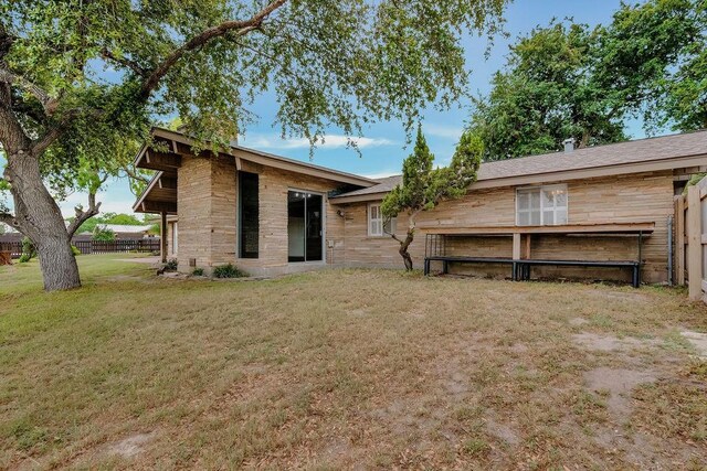 12308 Up River Rd, Corpus Christi, TX 78410 - rear view of property with stone siding