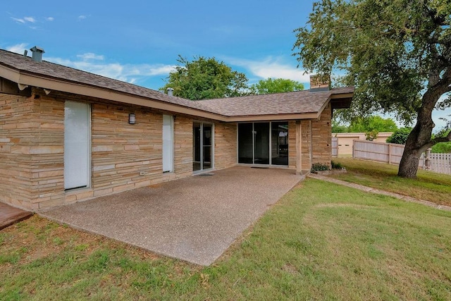 12308 Up River Rd, Corpus Christi, TX 78410 - back of property with a patio, a chimney, and a shingled roof