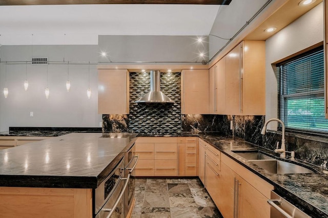 12308 Up River Rd, Corpus Christi, TX 78410 - kitchen with light brown cabinetry, a sink, dark countertops, and backsplash