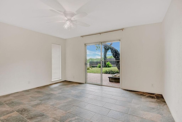 12308 Up River Rd, Corpus Christi, TX 78410 - spare room featuring ceiling fan and baseboards