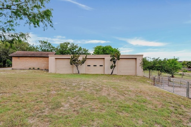 12308 Up River Rd, Corpus Christi, TX 78410 - view of yard featuring an outbuilding and a garage
