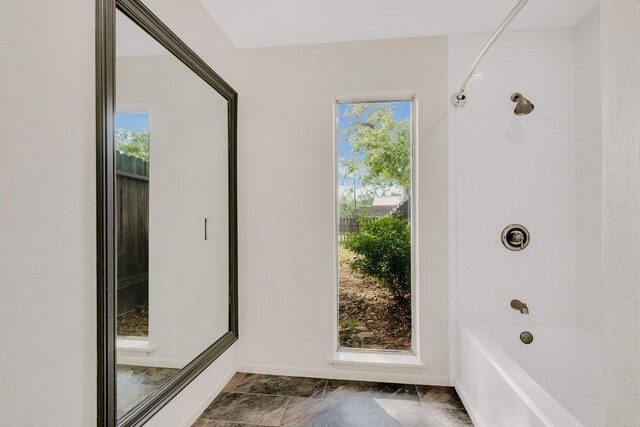 12308 Up River Rd, Corpus Christi, TX 78410 - full bathroom with washtub / shower combination and plenty of natural light