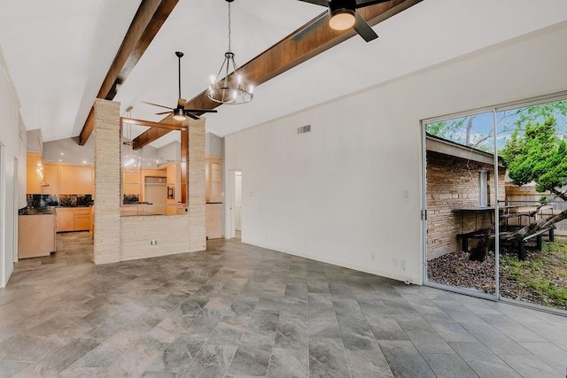 12308 Up River Rd, Corpus Christi, TX 78410 - unfurnished living room with a ceiling fan, beam ceiling, and high vaulted ceiling