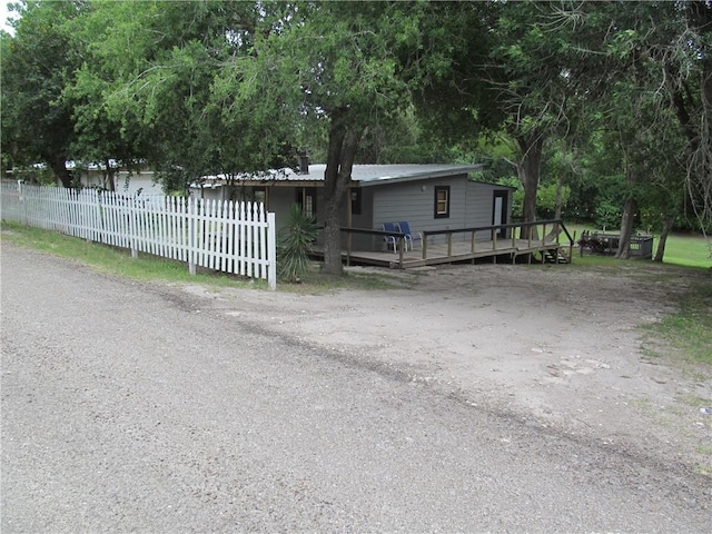 119 Horse Shoe Clf, Sandia, TX 78383 - view of front facade with a wooden deck