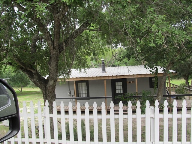 119 Horse Shoe Clf, Sandia, TX 78383 - view of front facade featuring a porch and metal roof