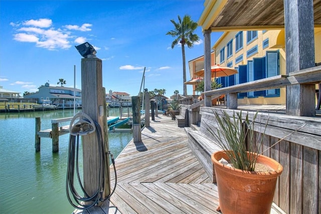 dock area featuring a water view and boat lift