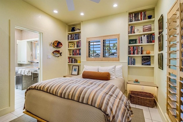 bedroom with light tile patterned floors, baseboards, connected bathroom, and recessed lighting