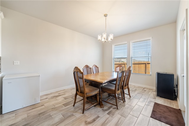 dining room featuring a chandelier