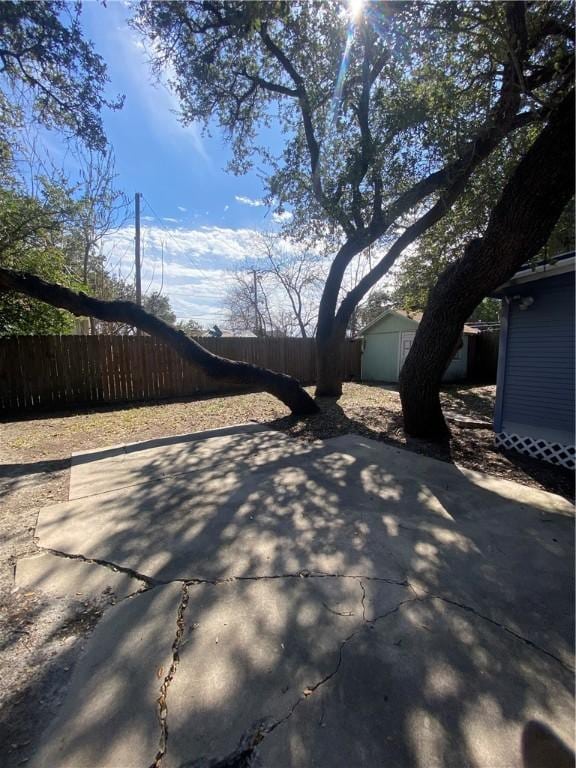 exterior space featuring a shed