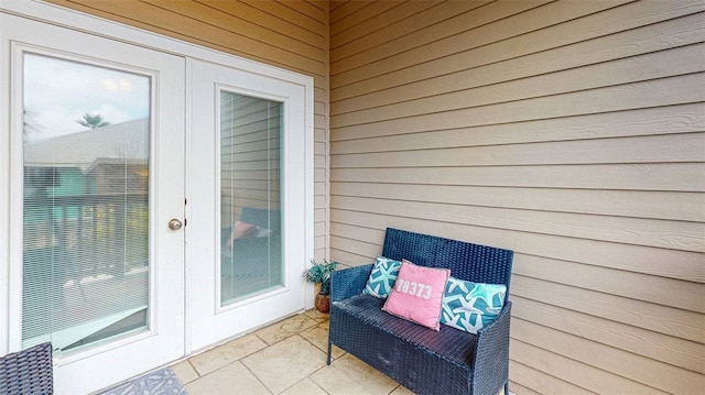 balcony featuring french doors