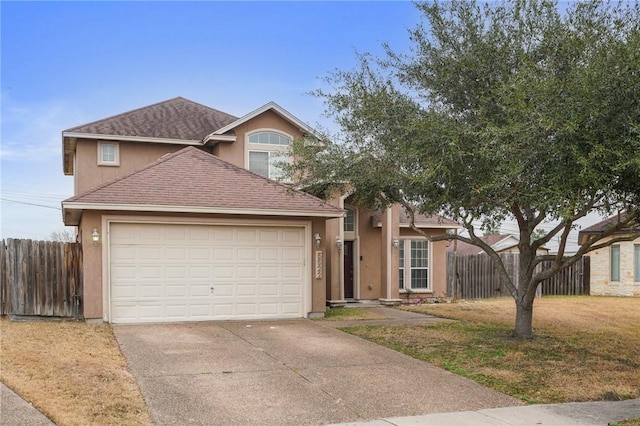 view of front property with a garage and a front lawn