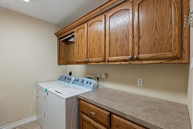 2618 Gentle Wind Ave, Corpus Christi, TX 78414 - washroom with cabinet space and washer and clothes dryer