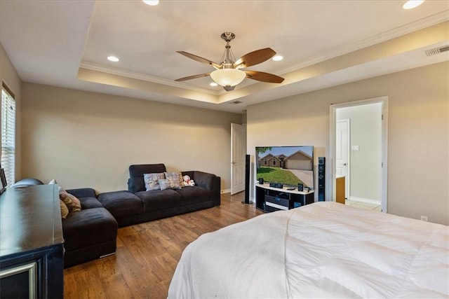 2618 Gentle Wind Ave, Corpus Christi, TX 78414 - bedroom featuring recessed lighting, wood finished floors, ornamental molding, a tray ceiling, and ceiling fan