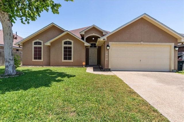 2618 Gentle Wind Ave, Corpus Christi, TX 78414 - ranch-style house featuring stucco siding, an attached garage, driveway, and a front lawn