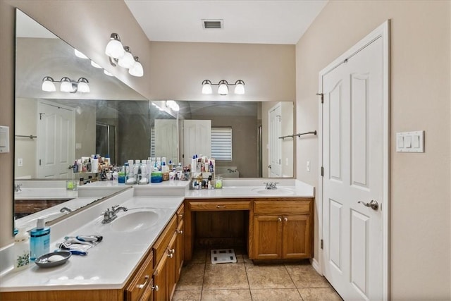 2618 Gentle Wind Ave, Corpus Christi, TX 78414 - bathroom featuring double vanity, tile patterned floors, and a shower stall