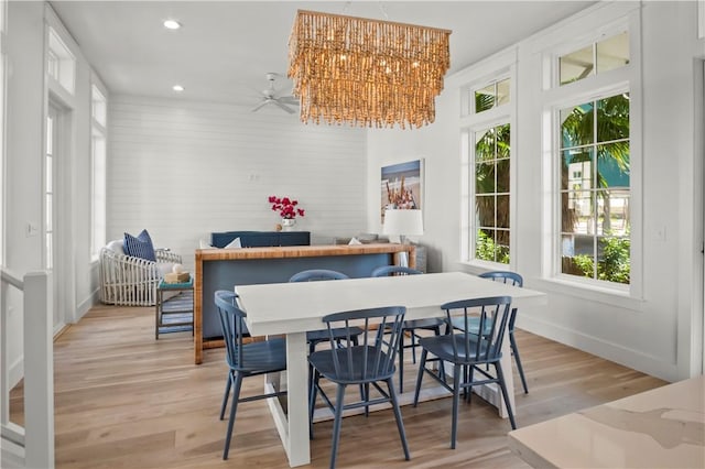 dining space featuring a ceiling fan, recessed lighting, light wood-style flooring, and baseboards