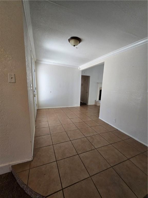4109 Eagle Dr, Corpus Christi, TX 78413 - tiled empty room with crown molding and a textured wall