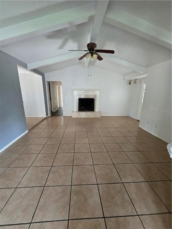 4109 Eagle Dr, Corpus Christi, TX 78413 - unfurnished living room featuring a ceiling fan, light tile patterned flooring, and a premium fireplace
