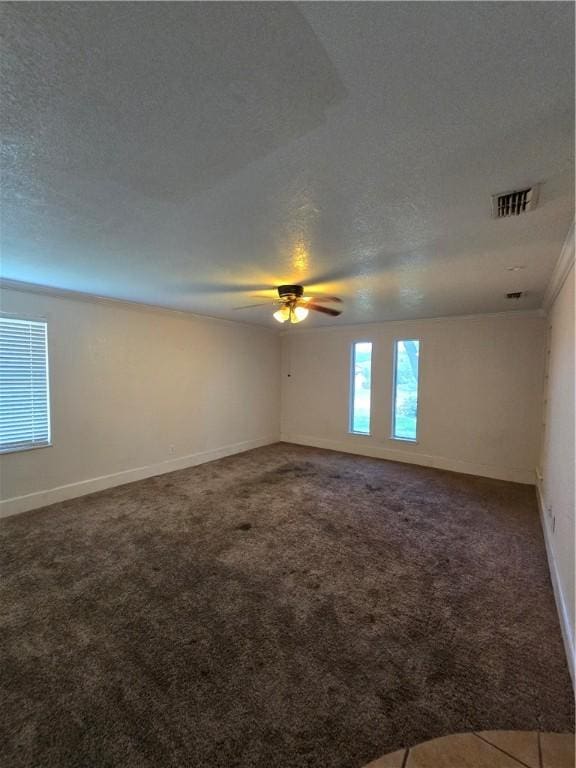 4109 Eagle Dr, Corpus Christi, TX 78413 - spare room featuring a textured ceiling, carpet floors, and ceiling fan