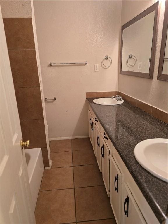 4109 Eagle Dr, Corpus Christi, TX 78413 - full bath with double vanity and tile patterned floors