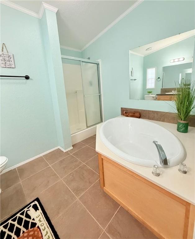 1182 Lee Rd, Aransas Pass, TX 78336 - full bath with crown molding, a stall shower, a bath, toilet, and tile patterned flooring