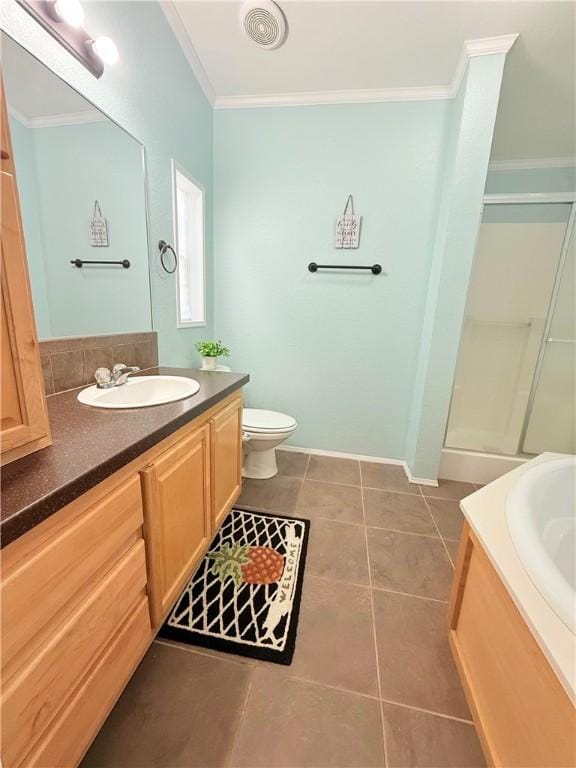 1182 Lee Rd, Aransas Pass, TX 78336 - bathroom with vanity, crown molding, toilet, a stall shower, and tile patterned flooring