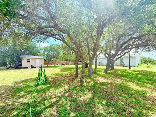 1182 Lee Rd, Aransas Pass, TX 78336 - view of yard with a storage unit
