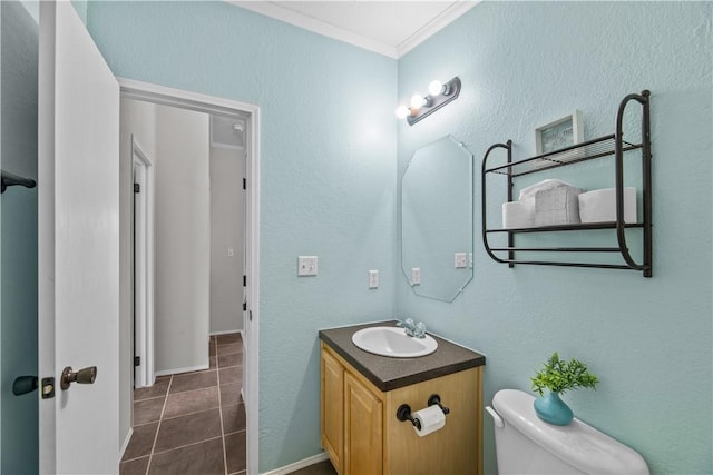 1182 Lee Rd, Aransas Pass, TX 78336 - bathroom with vanity, ornamental molding, and tile patterned flooring