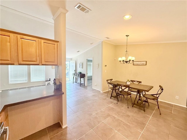 1182 Lee Rd, Aransas Pass, TX 78336 - dining space with ornamental molding, a chandelier, lofted ceiling, baseboards, and light tile patterned floors