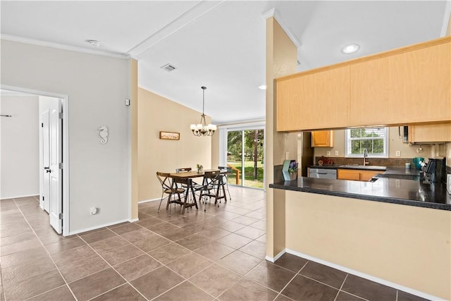 1182 Lee Rd, Aransas Pass, TX 78336 - kitchen featuring ornamental molding, range, plenty of natural light, vaulted ceiling, and a chandelier