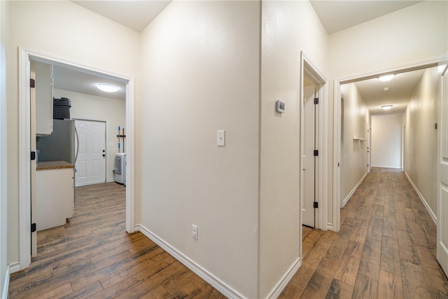 corridor featuring hardwood / wood-style flooring