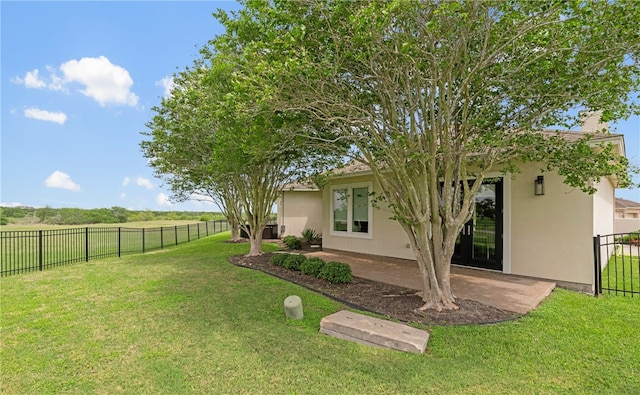 view of yard featuring a fenced backyard and a patio area
