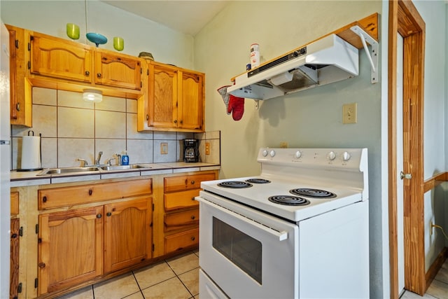 kitchen featuring sink, tasteful backsplash, light tile patterned floors, white electric stove, and range hood