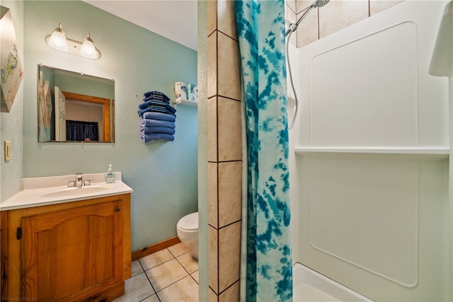 bathroom featuring toilet, a shower with curtain, vanity, and tile patterned floors