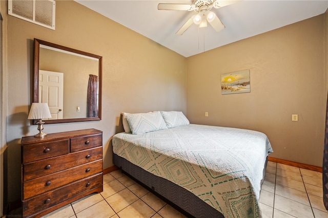 bedroom featuring light tile patterned flooring and ceiling fan