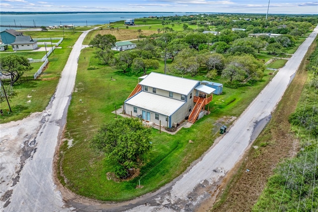 drone / aerial view featuring a water view