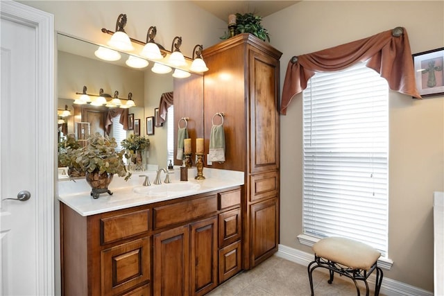 bathroom with vanity and tile patterned floors