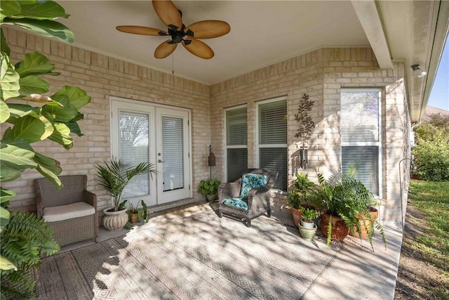 7510 Beau Terre, Corpus Christi, TX 78414 - view of exterior entry with french doors, ceiling fan, and stone siding