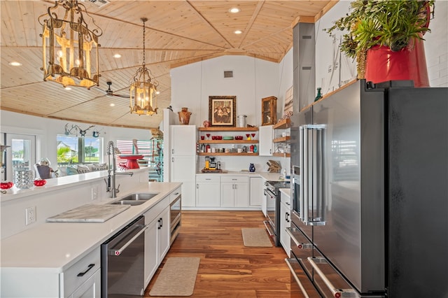 kitchen featuring sink, wooden ceiling, pendant lighting, white cabinets, and appliances with stainless steel finishes