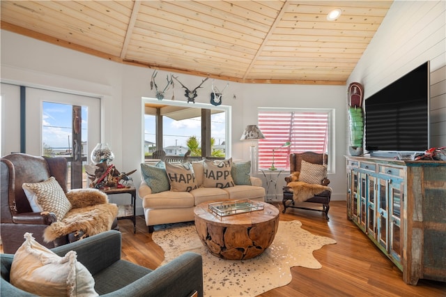 living room with a wealth of natural light, wood ceiling, and wood-type flooring