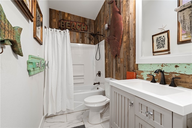 full bathroom featuring vanity, toilet, shower / bath combo with shower curtain, and wood walls