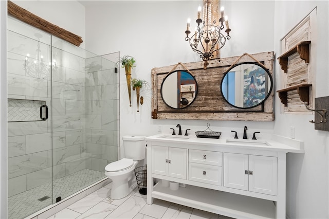 bathroom with walk in shower, vanity, a notable chandelier, and toilet