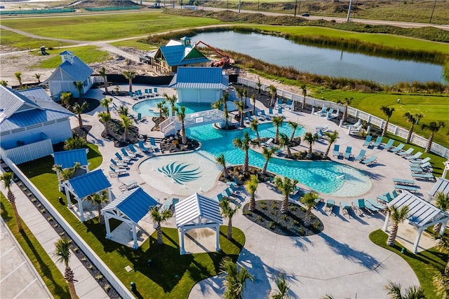 144 Sunrise Ave, Port Aransas, TX 78373 - drone / aerial view of a pool area and a large body of water
