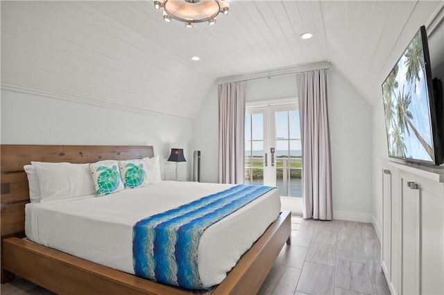 144 Sunrise Ave, Port Aransas, TX 78373 - bedroom with vaulted ceiling, access to exterior, baseboards, and recessed lighting