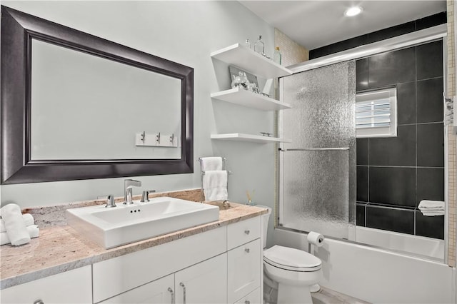 144 Sunrise Ave, Port Aransas, TX 78373 - full bath featuring toilet, vanity, and enclosed tub / shower combo