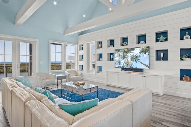 144 Sunrise Ave, Port Aransas, TX 78373 - living area with french doors and light wood finished floors