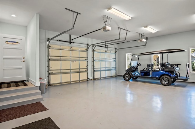 144 Sunrise Ave, Port Aransas, TX 78373 - garage with a garage door opener