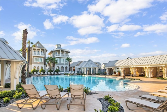 144 Sunrise Ave, Port Aransas, TX 78373 - community pool with a patio area