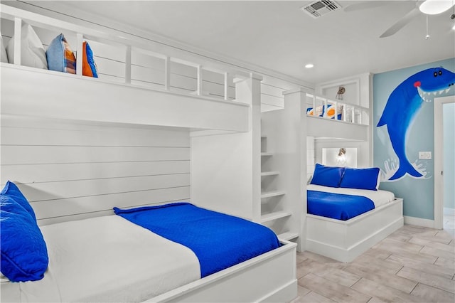 144 Sunrise Ave, Port Aransas, TX 78373 - bedroom featuring ceiling fan, wood finished floors, recessed lighting, and baseboards