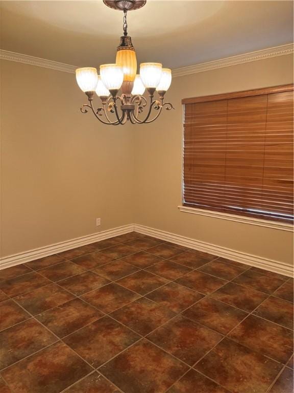 empty room featuring a chandelier and crown molding